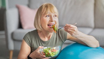 Woman eating a salad