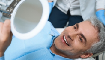 The placement of your new teeth is the final step in the four step dental implant process