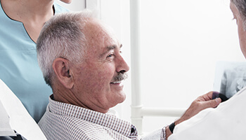 Elderly dental patient smiling