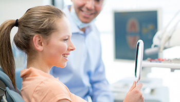 Woman viewing digital x ray in Danville dental office