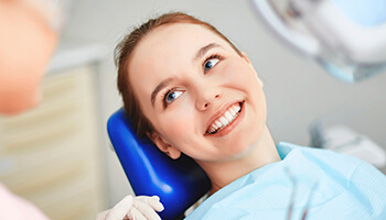 Young patient smiling in dental chair