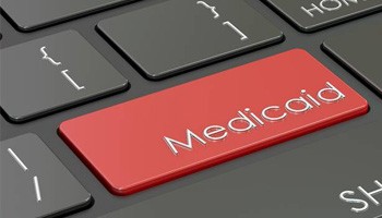 Key on computer keyboard that says Medicaid