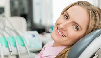 Smiling woman in dental chair