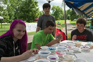 kids enjoying face painting