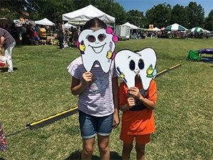 Kids with tooth masks