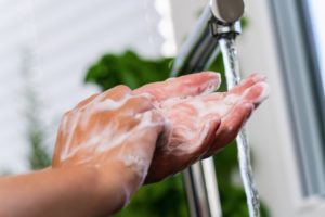 Danville dentist washing hands during COVID-19 pandemic