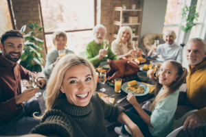 a family enjoying a Thanksgiving meal together 